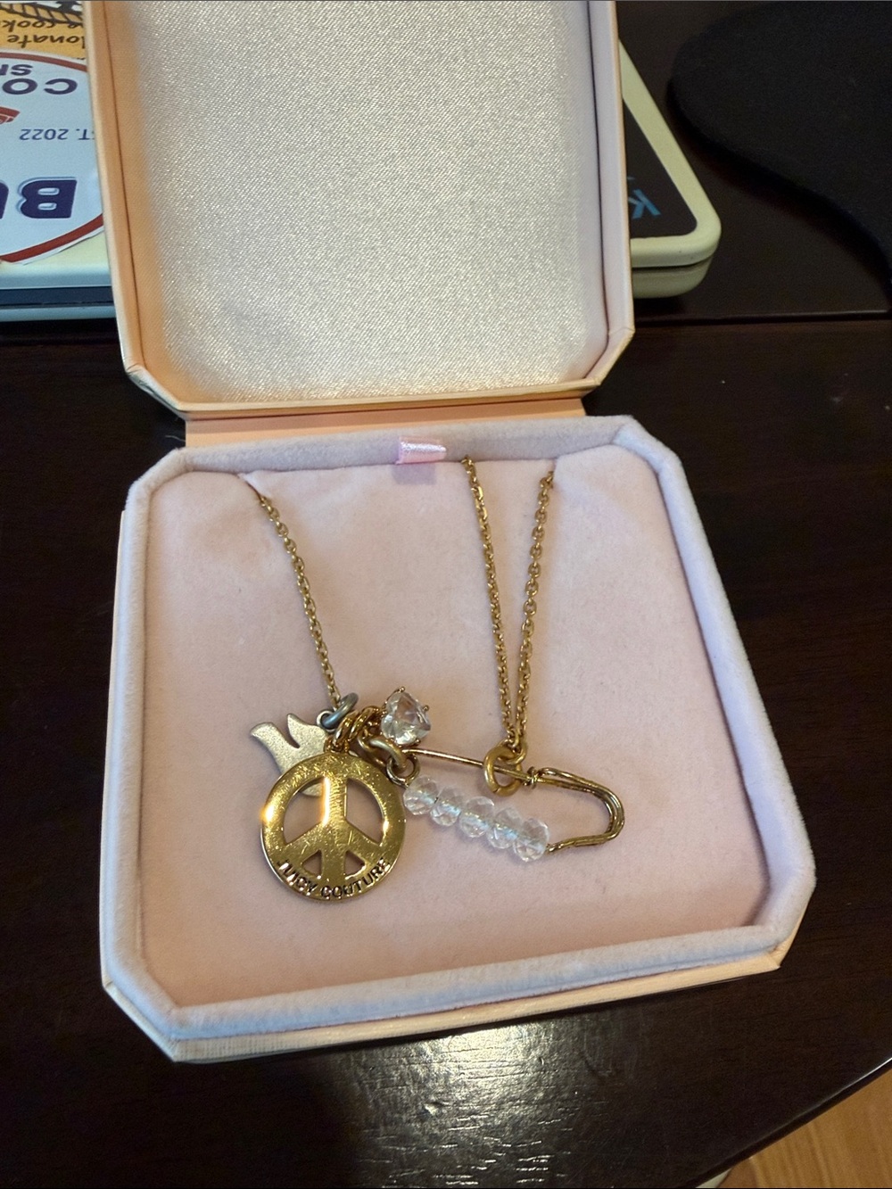JUICY COUTURE - Pam and Gela safety pin necklace with gem, peace sign, dove. BOX